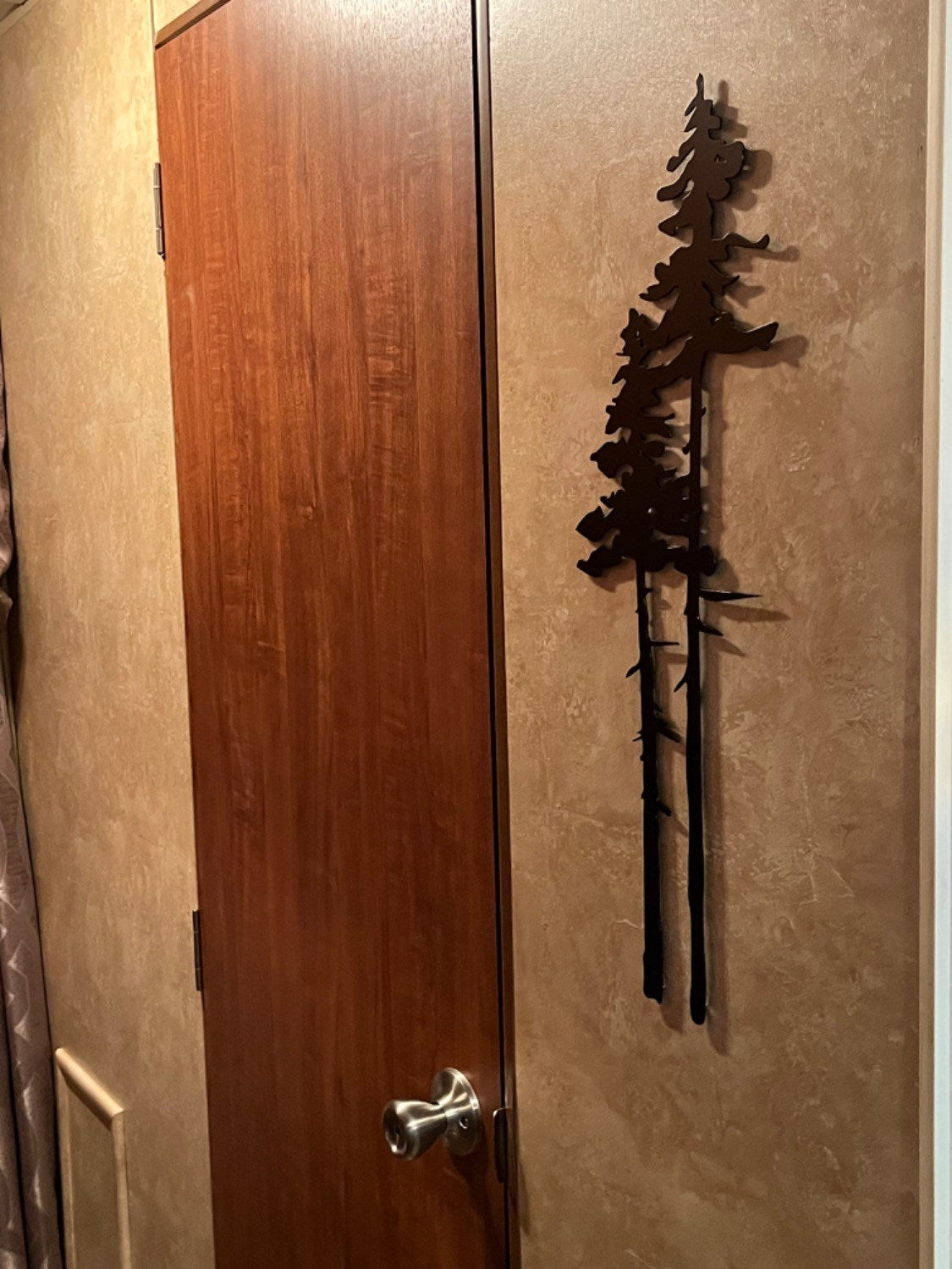 Two Tall Metal Evergreen Trees