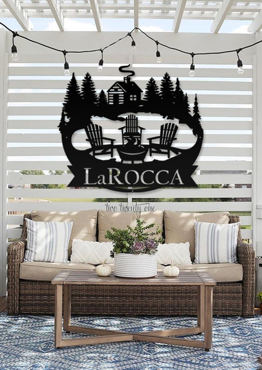 A Monogram Cabin With 3 Chairs Around a Campfire