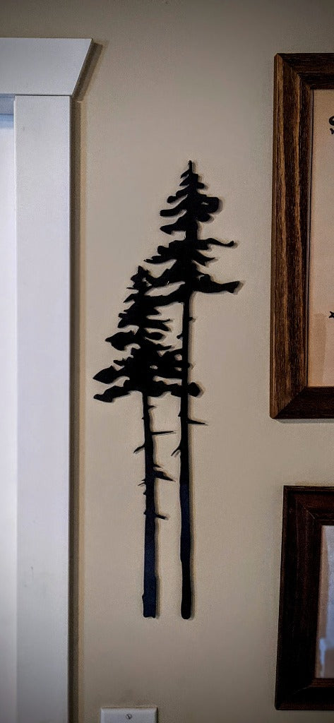 Two Tall Metal Evergreen Trees