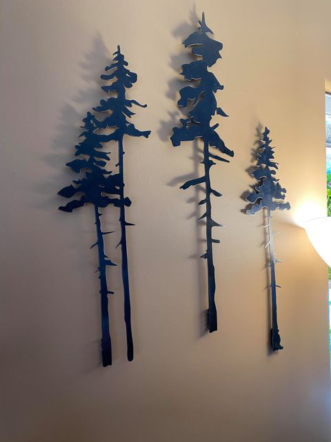 Two Tall Metal Evergreen Trees