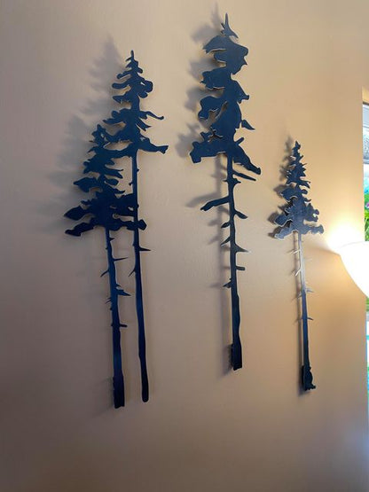 Two Tall Metal Evergreen Trees